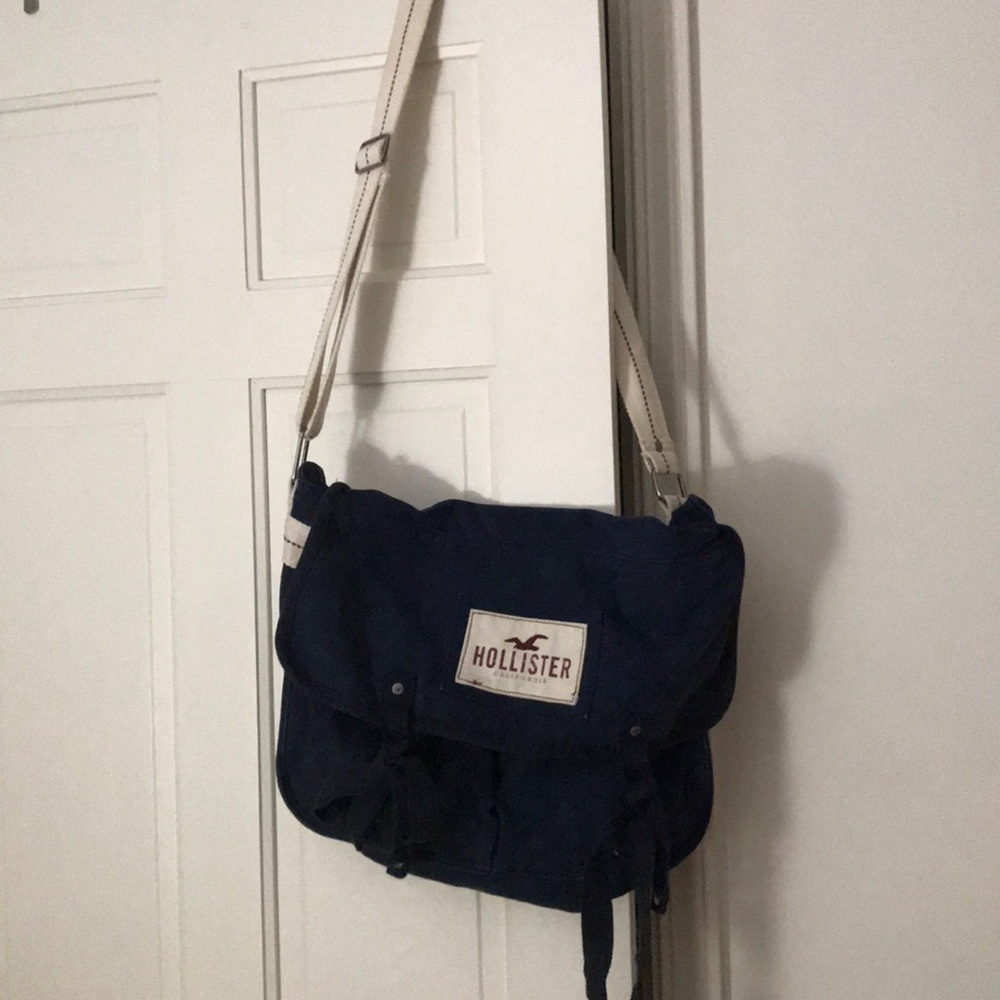 Hollister saddle bag. Navy blue and off white.